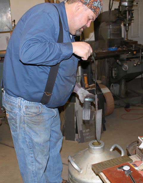 Heat treating a blade.