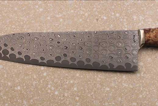 This is a 9"bubblewrap gyuto that Hoss did recently for a Knife Forums member.