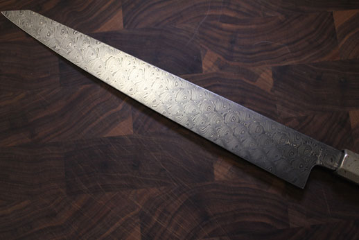 300mm Sujihiki in Bubblewrap double carbon with mokume ferule.