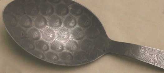 Stainless Bubble Wrap patterned chefs spoon.